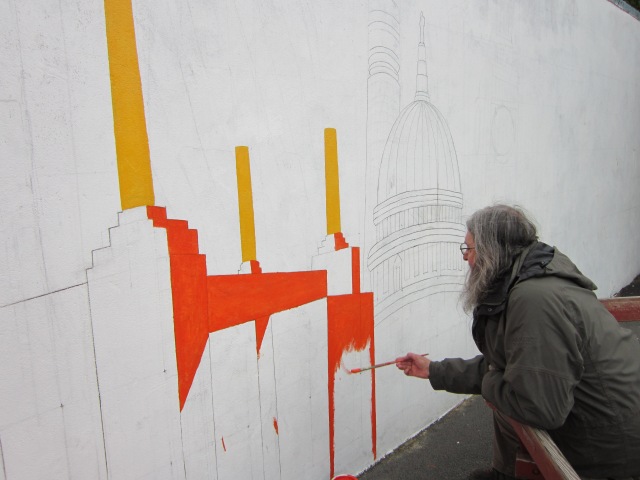 Brian Barnes at work on Battersea Power Station section of Chesterton School Mural, 2012